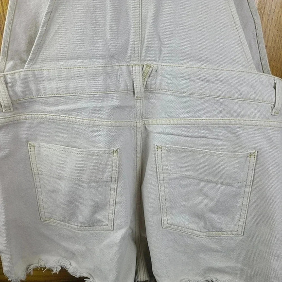 Free People cream colored sun-kissed denim short overalls with fringe leg size10 - Picture 11 of 14